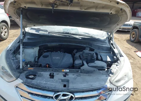 2014 Hyundai Santa Fe Sport 2.4L z USA, uszkodzony, nr VIN 5XYZU3LB1EG191178